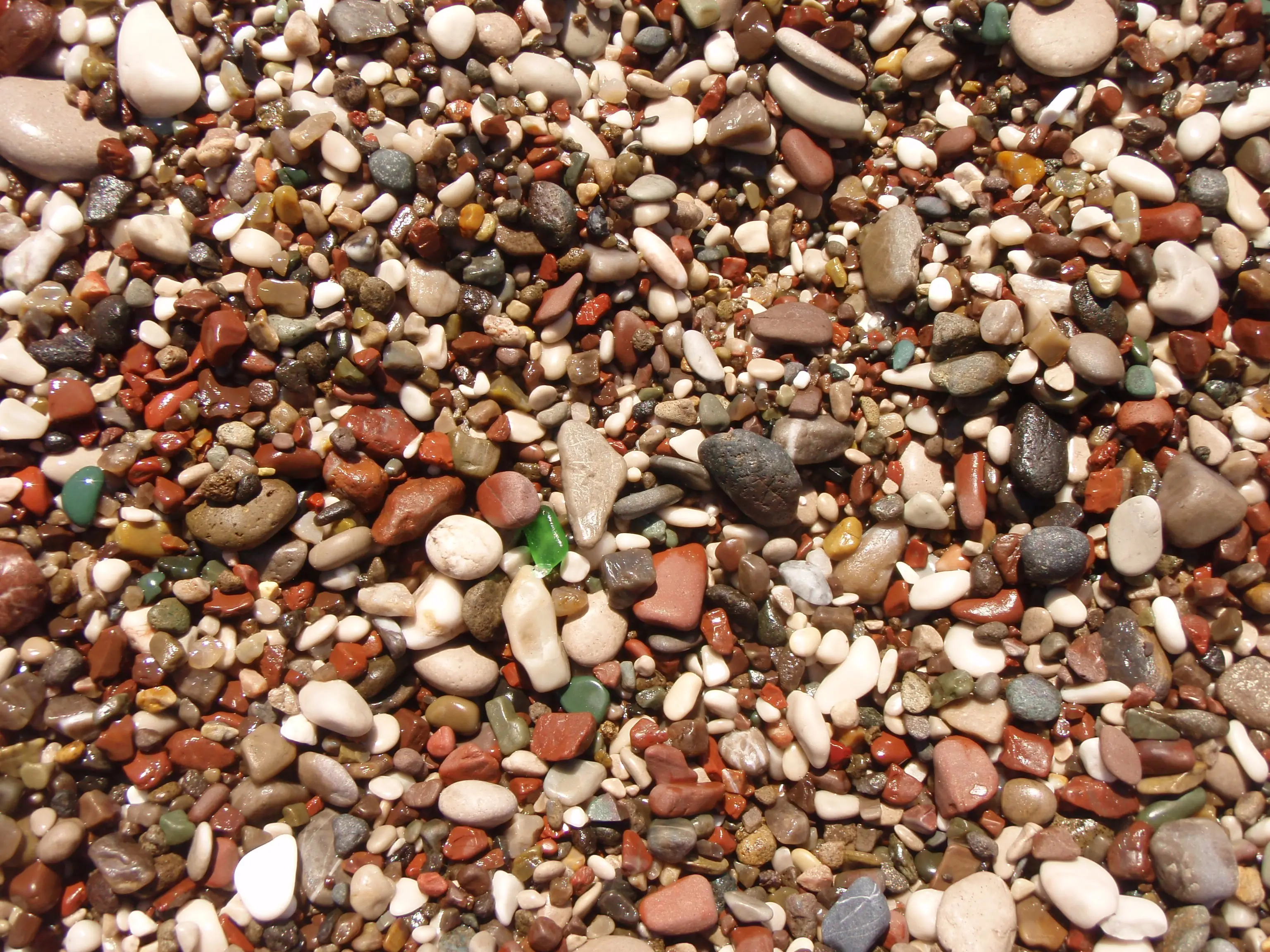 Smooth rocks and sea glass representing peace and healing