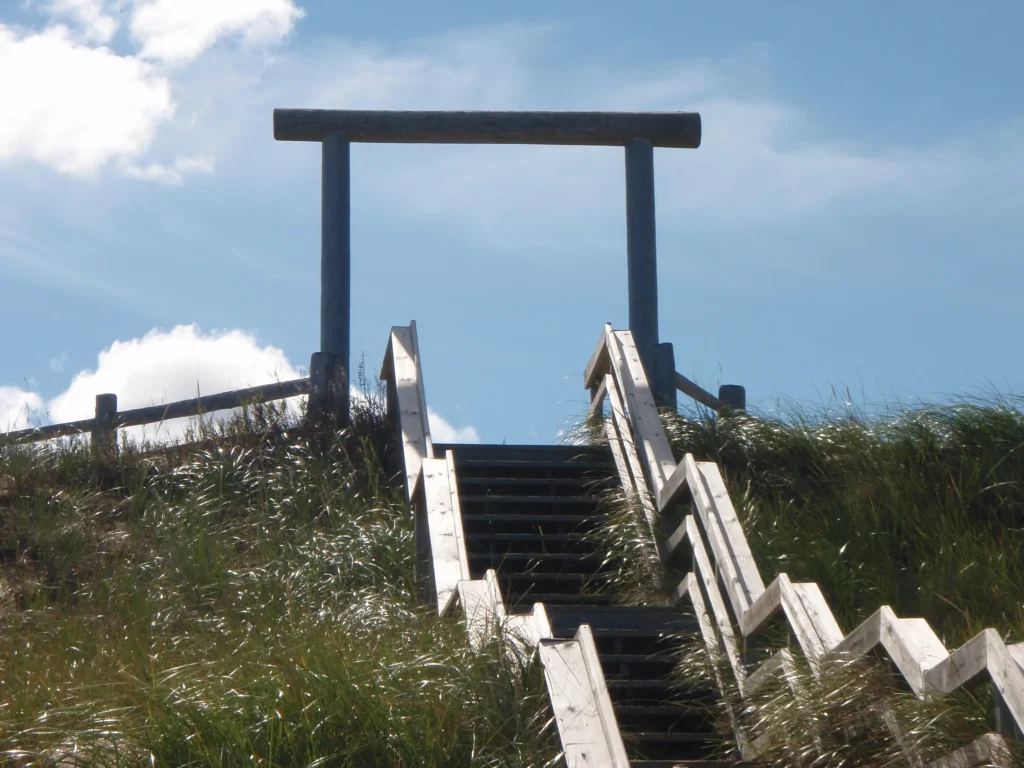 Traditional Japanese torii gate at sunset symbolizing transition and new beginnings